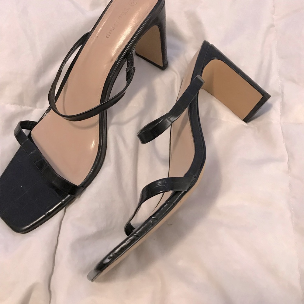 Black crocodile contemporary sandal heel